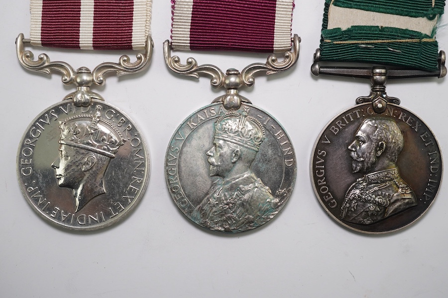 A Geo V India Meritorious Service Medal 1888 to 3999 Sepoy Bhuluam Mohd 3/16 Punjab R., Geo VI Meritorious Service Medal to Indian Army M.E. 57074 Hav Khansi Ram IEME, Geo V Colonial Auxiliary Forces Long Service medal u